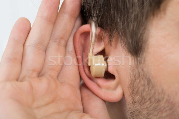 クローズアップ 男 着用 補聴器 耳 リスニング ストックフォト © AndreyPopov