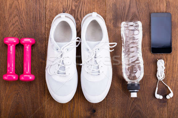 Stock photo: Exercise Equipment On Wooden Floor