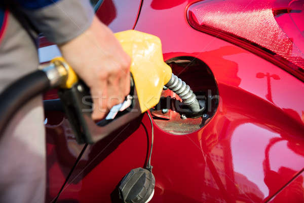 Stock photo: Person's Hand Refueling Car's Tank