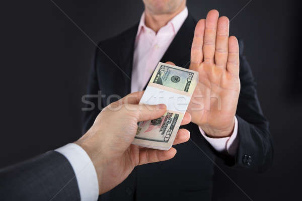 Businessman Refusing To Take A Bribe Stock photo © AndreyPopov