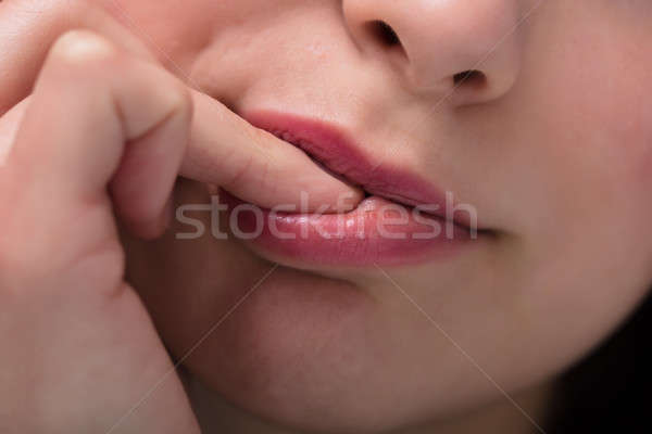 Stock photo: Businesswoman Biting Her Fingernail