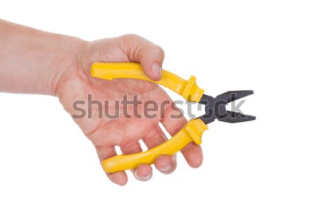 Hand Holding Plier With Yellow Grips Stock photo © AndreyPopov