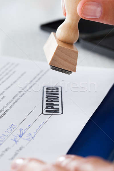 Business Man Hand With Rubber Stamp Stock photo © AndreyPopov