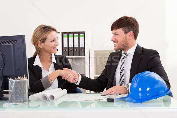 Architects shaking hands in the office Stock photo © AndreyPopov