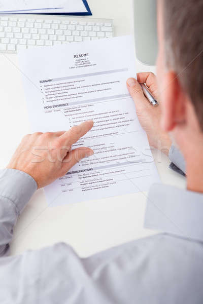 Man Holding Curriculum Vitae Stock photo © AndreyPopov