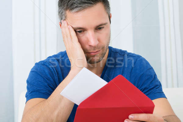 Man Looking At Letter Stock photo © AndreyPopov
