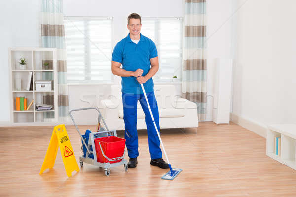 Stockfoto: Werknemer · schoonmaken · nat · vloer · teken