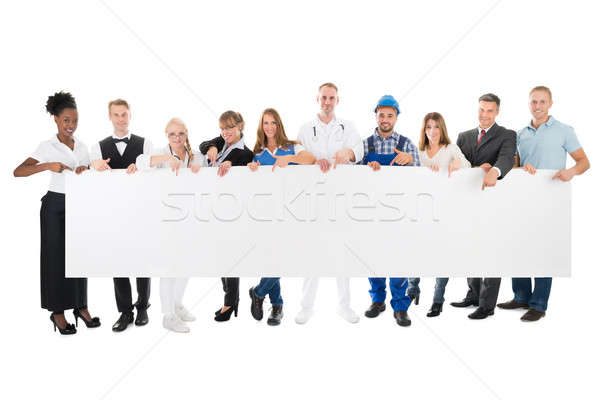 Emberek különböző tart óriásplakát csoport portré Stock fotó © AndreyPopov