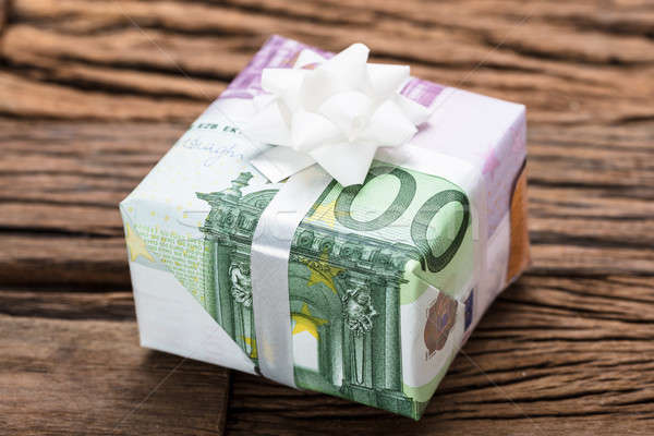 Gift Box Made From Euro Papernotes On Table Stock photo © AndreyPopov