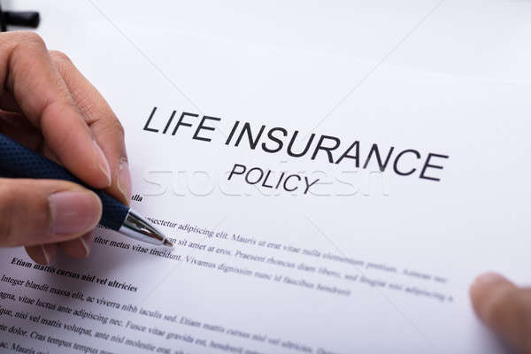 Person Filling Life Insurance Policy Form Stock photo © AndreyPopov