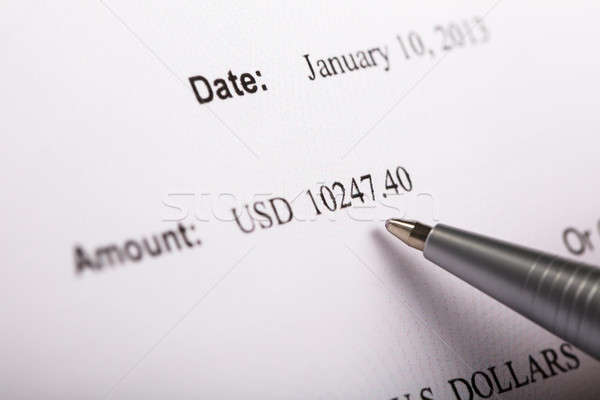 Pen cheque tonen bedrag geld Stockfoto © AndreyPopov