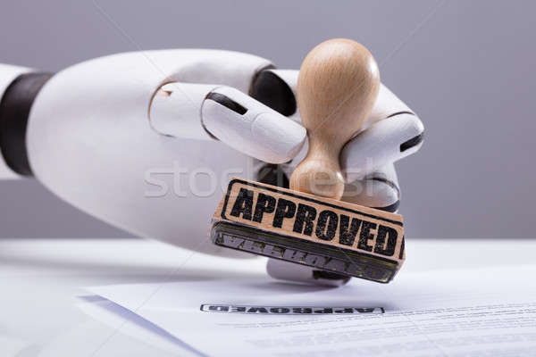 Robot Hand Approving Document Stock photo © AndreyPopov