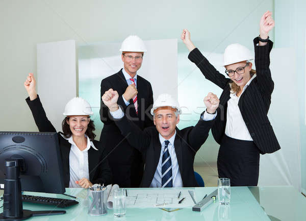 Cheering architectural team Stock photo © AndreyPopov