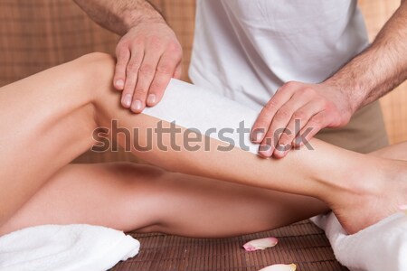 Beautician doing depilation Stock photo © AndreyPopov