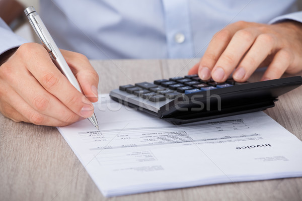 бизнесмен финансовых расходы столе бизнеса бумаги Сток-фото © AndreyPopov