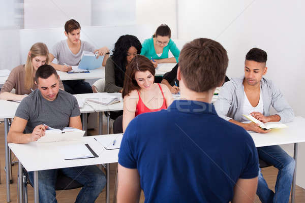 Leraar onderwijs universiteit studenten achteraanzicht klas Stockfoto © AndreyPopov