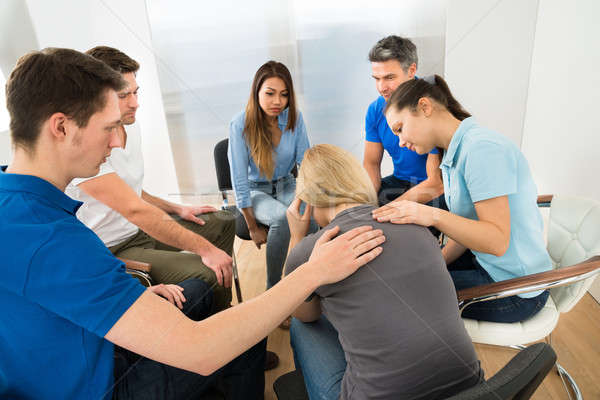 People Consoling Their Friend Stock photo © AndreyPopov