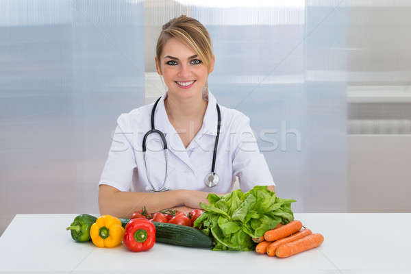 Female Dietician With Vegetables Stock photo © AndreyPopov