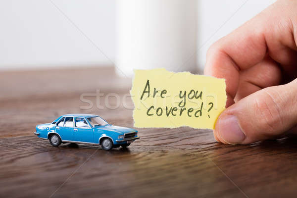 Are You Covered Concept In Front Of A Car Stock photo © AndreyPopov