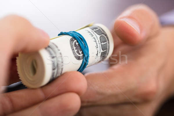 Person Offering Bribe Stock photo © AndreyPopov