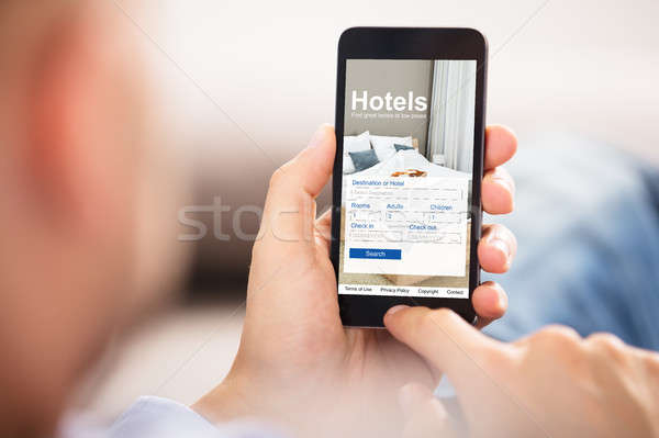 Person Searching Online Low Prices Hotels Stock photo © AndreyPopov