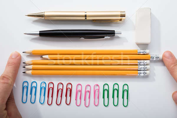 Person Arranging The Pencils On White Background Stock photo © AndreyPopov