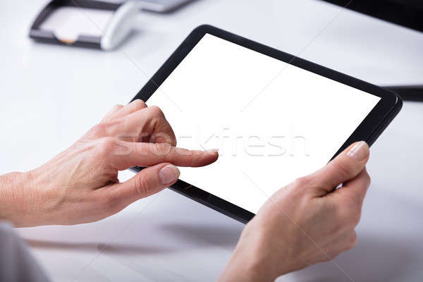 Woman Using Digital Tablet Stock photo © AndreyPopov