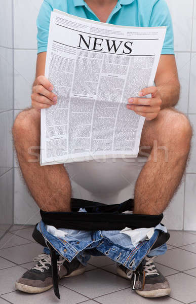 Close-up of a man in toilet Stock photo © AndreyPopov