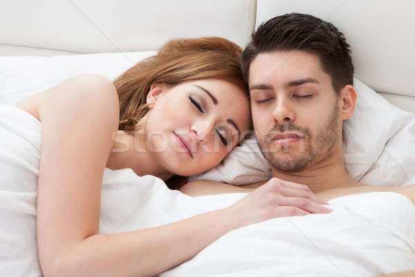 Lovely young couple sleeping Stock photo © AndreyPopov