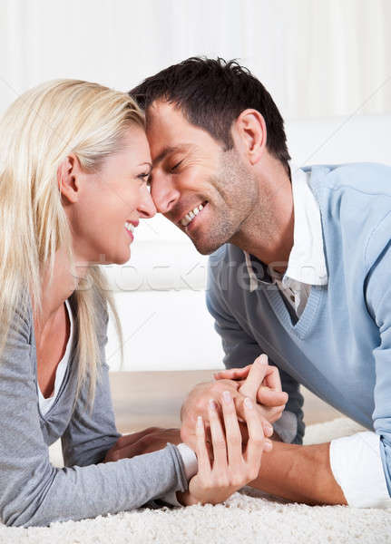 Young couple watching each other Stock photo © AndreyPopov