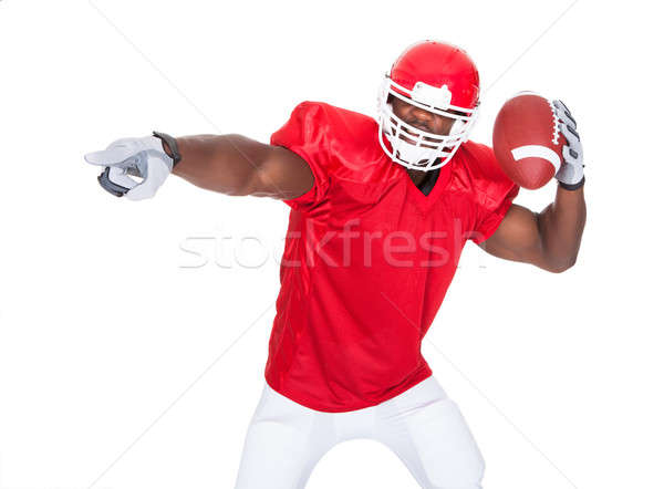 American Football Player Pointing Something Stock photo © AndreyPopov