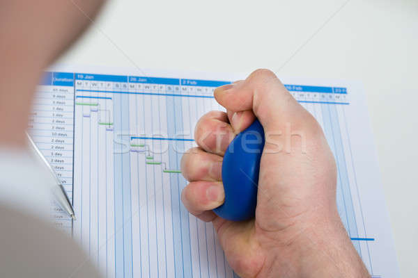 Businessperson Pressing Stressball Stock photo © AndreyPopov