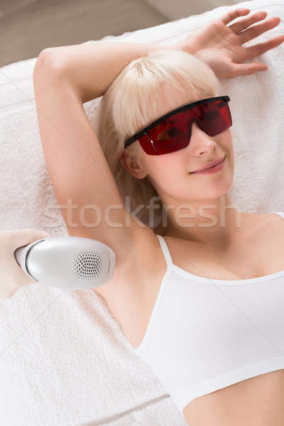 Woman Receiving Laser Epilation Treatment In Spa Stock photo © AndreyPopov