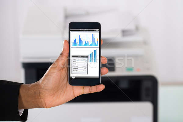 Geschäftsfrau Smartphone Druck Grafik Papier Stock foto © AndreyPopov