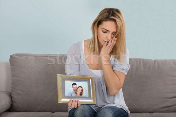 Infeliz mujer marco de imagen triste roto Foto stock © AndreyPopov