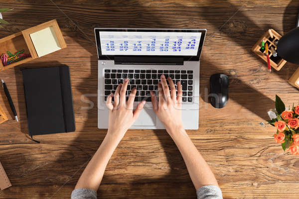 Person Using Laptop With Calendar On Screen Stock photo © AndreyPopov