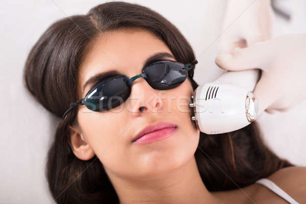Woman Getting A Ultrasound Skin Treatment Stock photo © AndreyPopov