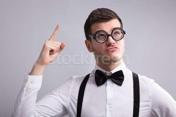 Contemplating Young Man Having An Idea Stock photo © AndreyPopov