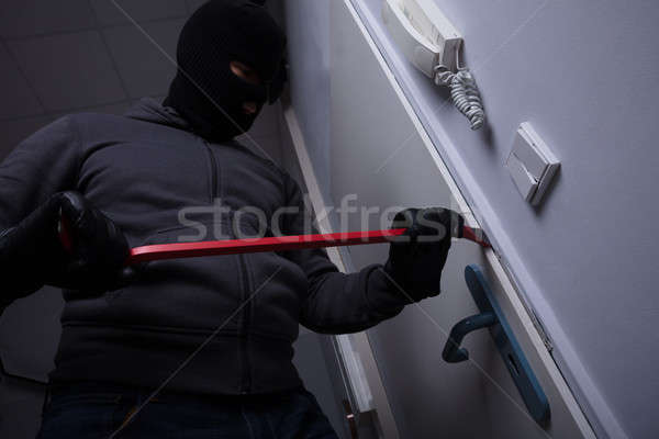 Tolvaj törik ajtó férfi otthon szerszám Stock fotó © AndreyPopov