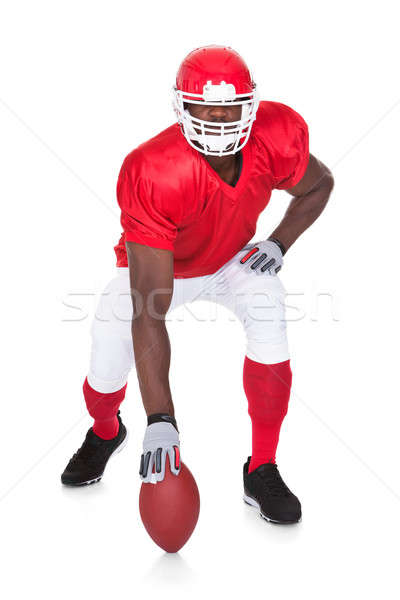 American Football Player In Attacking Position Stock photo © AndreyPopov