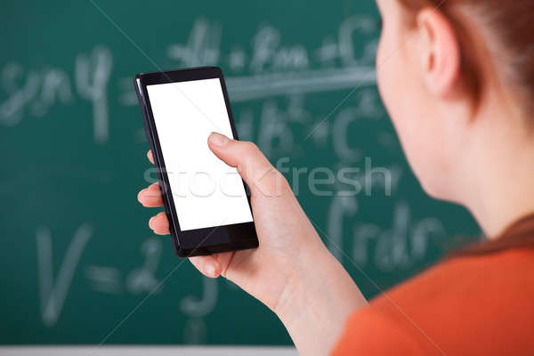 Főiskolai hallgató okostelefon osztályterem kép női számítógép Stock fotó © AndreyPopov