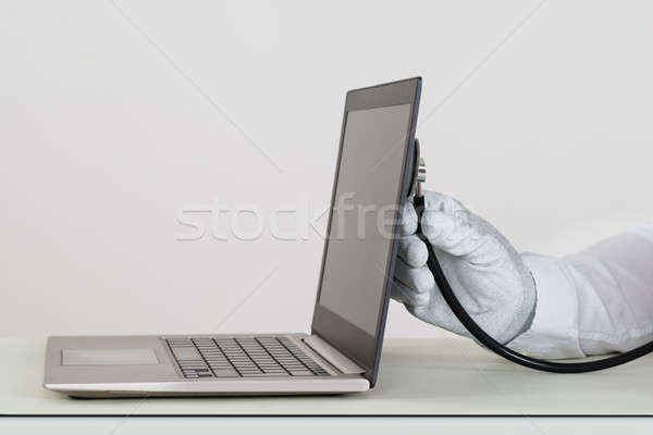 человек рук ноутбука стетоскоп белый Сток-фото © AndreyPopov