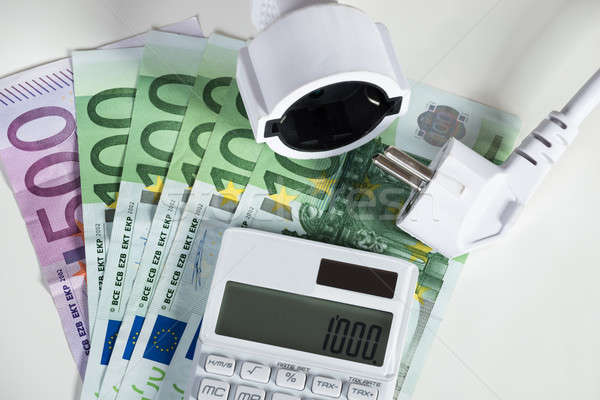 Stockfoto: Calculator · elektrische · plug · euro · bankbiljetten