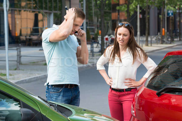 Man mobiele telefoon auto botsing triest jonge man Stockfoto © AndreyPopov