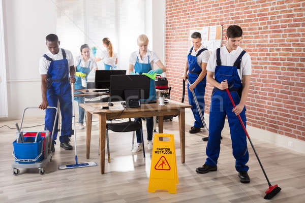 Janitors Cleaning The Office Stock photo © AndreyPopov