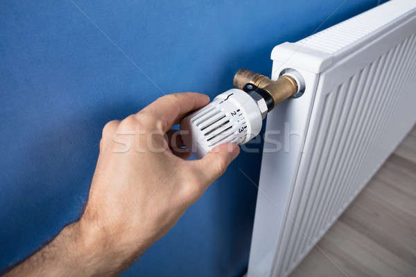 Foto stock: Mano · temperatura · termostato · personas · control · calor