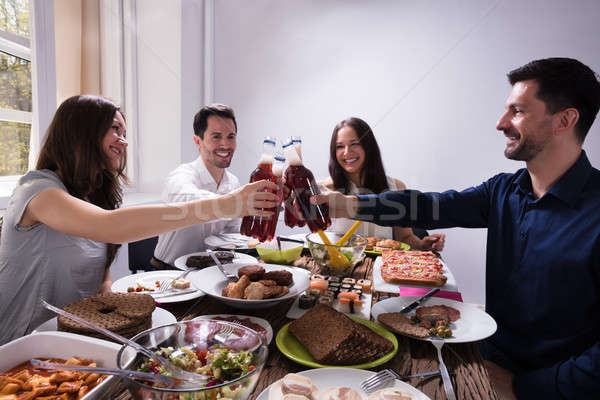 Friends Toasting With Bottles Of Beer Stock photo © AndreyPopov