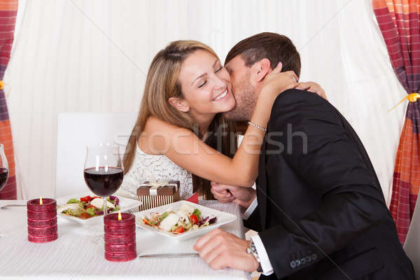 Young woman receives a gift Stock photo © AndreyPopov