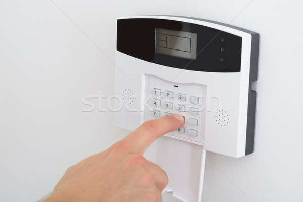 Finger Setting Security Alarm Stock photo © AndreyPopov