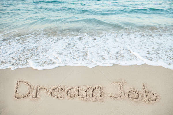 Dream Job Written On Sand By Sea Stock photo © AndreyPopov